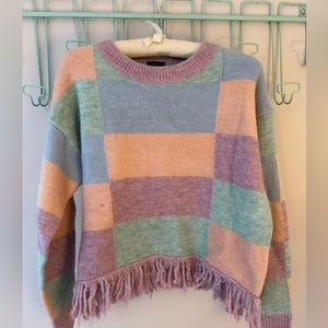 Boutique pastel sweater with fringe
